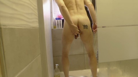 Ass-fucking session followed by a shower with a strap-on dildo for some self-pleasure